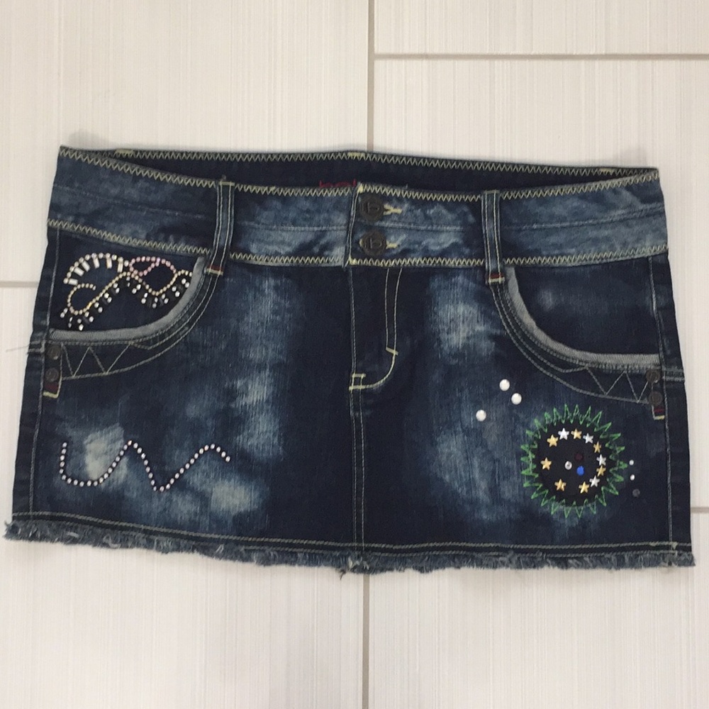 BeBe Mini Jean Skirt. Size 29. New Without Tags.